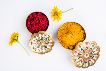 huldi kumkum or kum kumwith flowers, isolated over white background, indian tradition, Makar Sankranti hindu festival also known as huldi-kumkum occassion