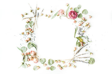 wreath frame with roses, lavender, branches, leaves and petals isolated on white background. flat lay, overhead view