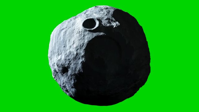 Detailed rotating asteroid or meteor with green screen background
