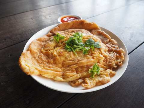 Omelet with pork and window dressing