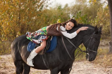 Foto op Canvas Woman hugging her horse © Zadiraka