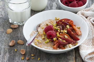 oatmeal with baked fruit and pistachios for breakfast