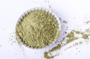 greentea powder. greentea powder on bakery cup top view  isolate