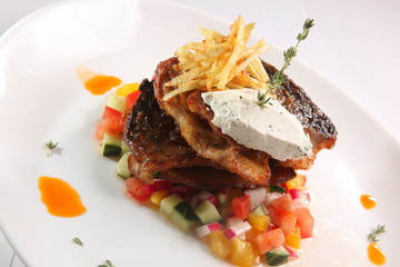 fried fish on vegetables