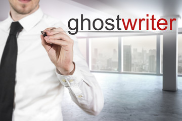 businessman writing ghostwriter in the air