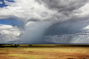 Fototapeta na wymiar Stormy skies and rain in the Africa