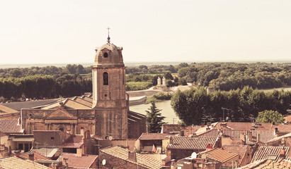 Obraz premium view above old french town Arles and Rhône river in the back