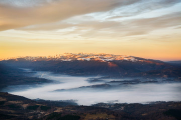 Sunset scene over Retezat Mountains , in Carpathian Mountains Romania