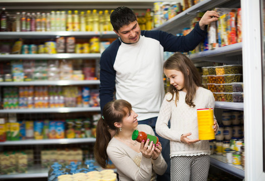 Ordinary family buying canned food