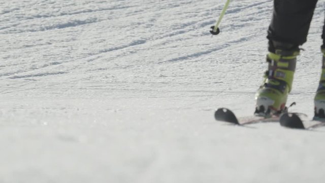 CLOSE UP: Skiing in the mountain resort on sunny morning