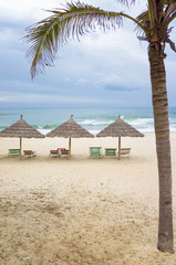 Sun beds and Palm shelters at China Beach