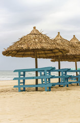 Sunbeds and Palm shelters at China Beach in Da Nang