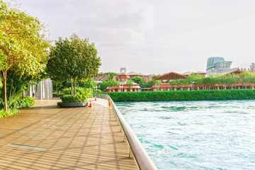 Tourists in Sentosa Boardwalk leading to Sentosa Island in Singa