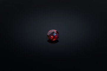Red Ruby on black shine table, 