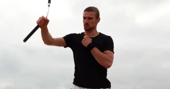 Fit man practicing martial arts