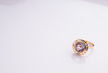 Jewel ring on white shine table