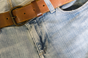 Blue jeans and leather belt