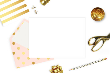 Fototapeta na wymiar Stationery and envelope isolated on white background. Modern background. Mock-up for your photo or text and work. Woman desktop, template card. Flat lay. Open envelope with blank