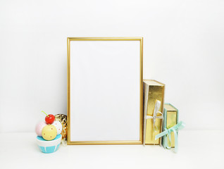 gold picture frame with decorations. Mock up for your photo or text Place your work, print art,shabby style, white background, pastel color book