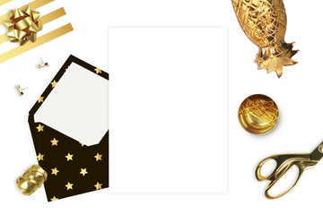 Flat lay. White background mockup. Woman accessories.Gold pineapple. Open envelope. Table view.