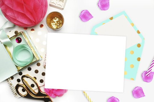 Flat lay. White background. Woman desktop, template card, Mock up for your photo or text Place your work. Gold Polka.
