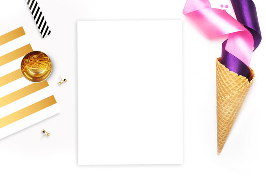 Flat lay, white background. Party photo, ice scream cone and colored ribbons. White background mockup