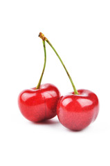 two cherries on a white background