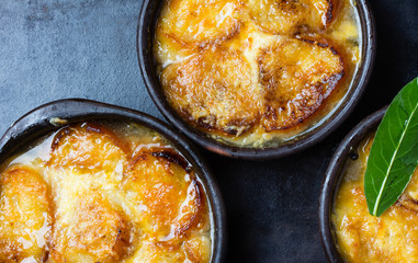Onion soup with dried bread and cheese. Top view