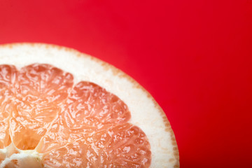 grapefruit with red background