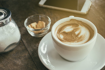 Cup of Coffee on Wooden Table. Selective Focus. Vintage filter s
