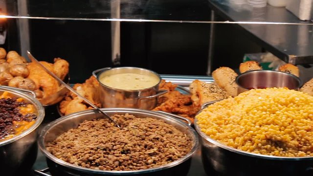 Buffet with cooked food at restaurant.