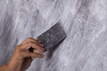 hand use brush for color paint concrete Loft style on wall