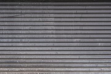 Obraz premium Old steel garage door stripped texture, horizontal lines