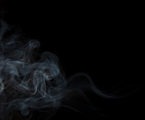 White smoke on black background