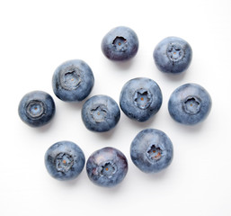 Blueberries (cyanococcus) isolated on white background