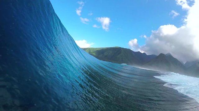 FPV SLOW MOTION: Pro surfer surfing big tube barrel wave