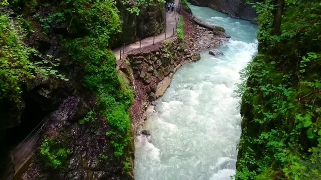Aerial view and camera flight over rapids in Partnach Gorge or Partnachklamm is a scenic location and nature attraction in Germany near Garmisch Paterkirchen. 