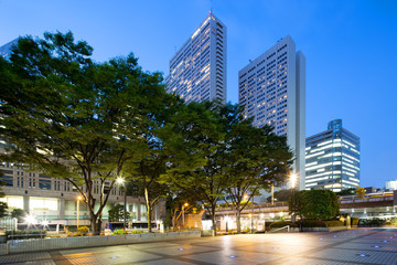 modern office buildings in downtown of tokyo at night