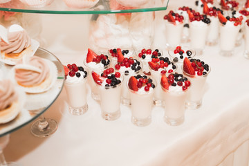 Delicious wedding reception candy bar dessert table