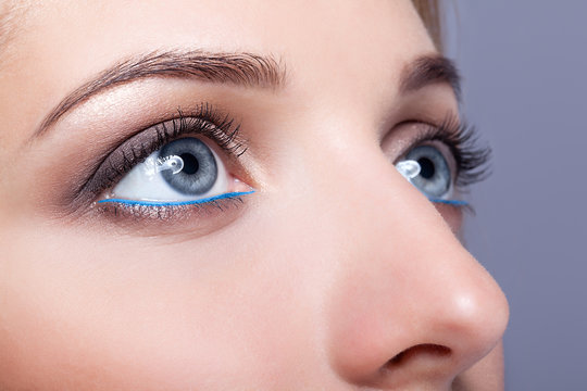 Closeup shot of female eyes with day makeup