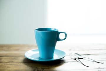 青いコーヒーカップ