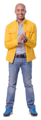 Smiling cutout young man standing in full growth. He is clapping hands while expresses his...