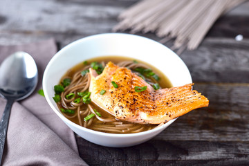 Bowl of soba noodle salmon asian soup