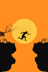 young man in silhouette jumps between two cliffs on big moon  ba