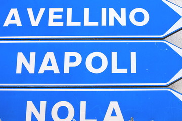 Road sign with the inscription: Avellino, Naples and Nola