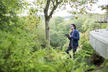 Fototapeta premium Analysing nature with digital tablet