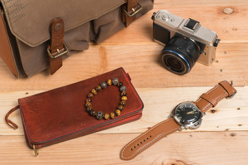 Outfit of traveler on old wooden background, Travel concept
