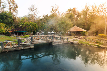 Fototapeta na wymiar Wonderful morning of gold steam hot spring with sunlight at Jae Son National Park,Thailand