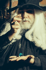 Old wizard pendant for hypnosis
