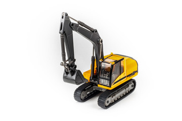 Miniature excavator isolated on white background